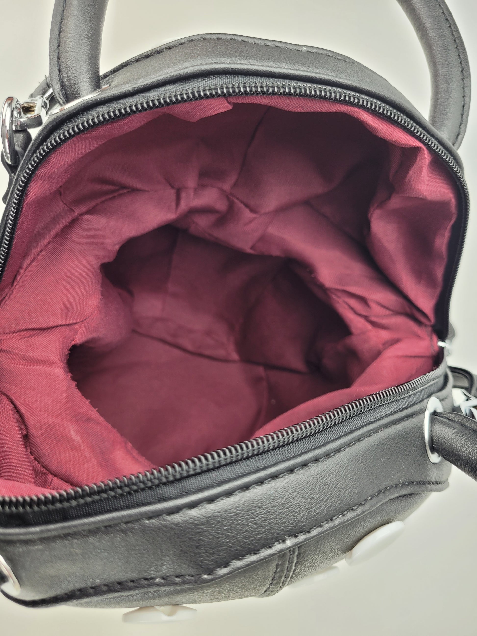 inside of black mushroom handbag