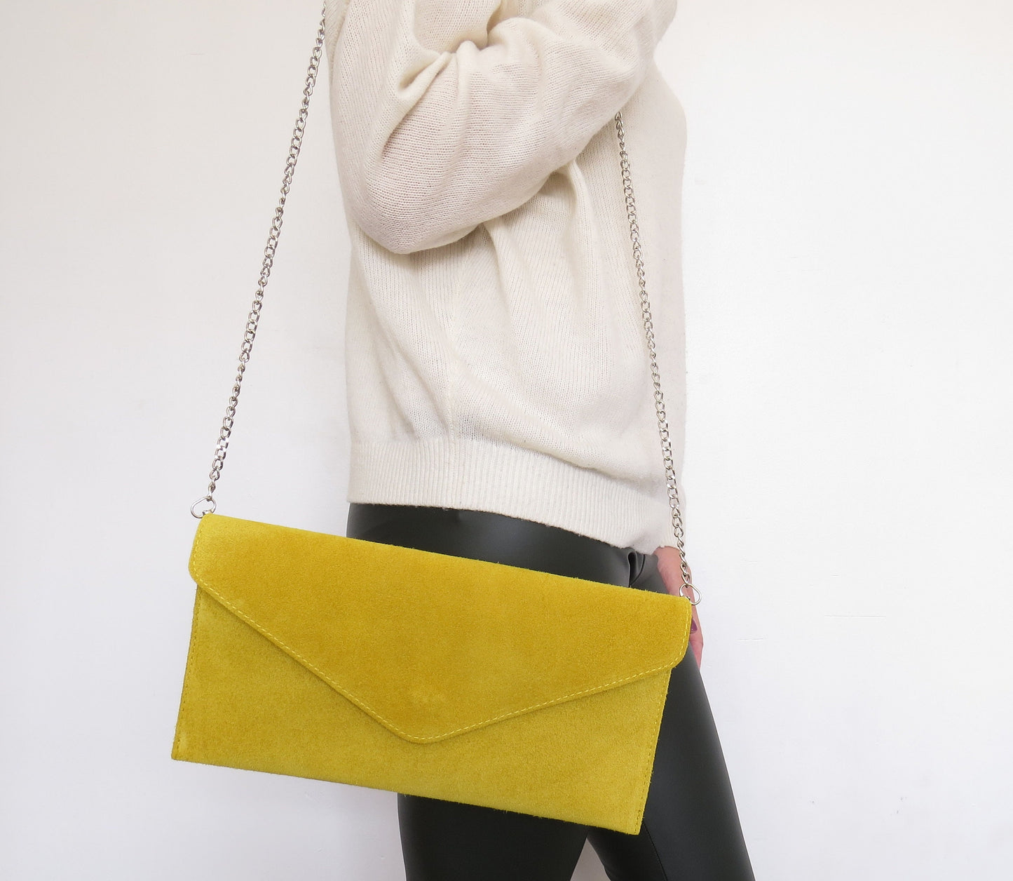 Yellow envelope clutch bag with chain shoulder strap