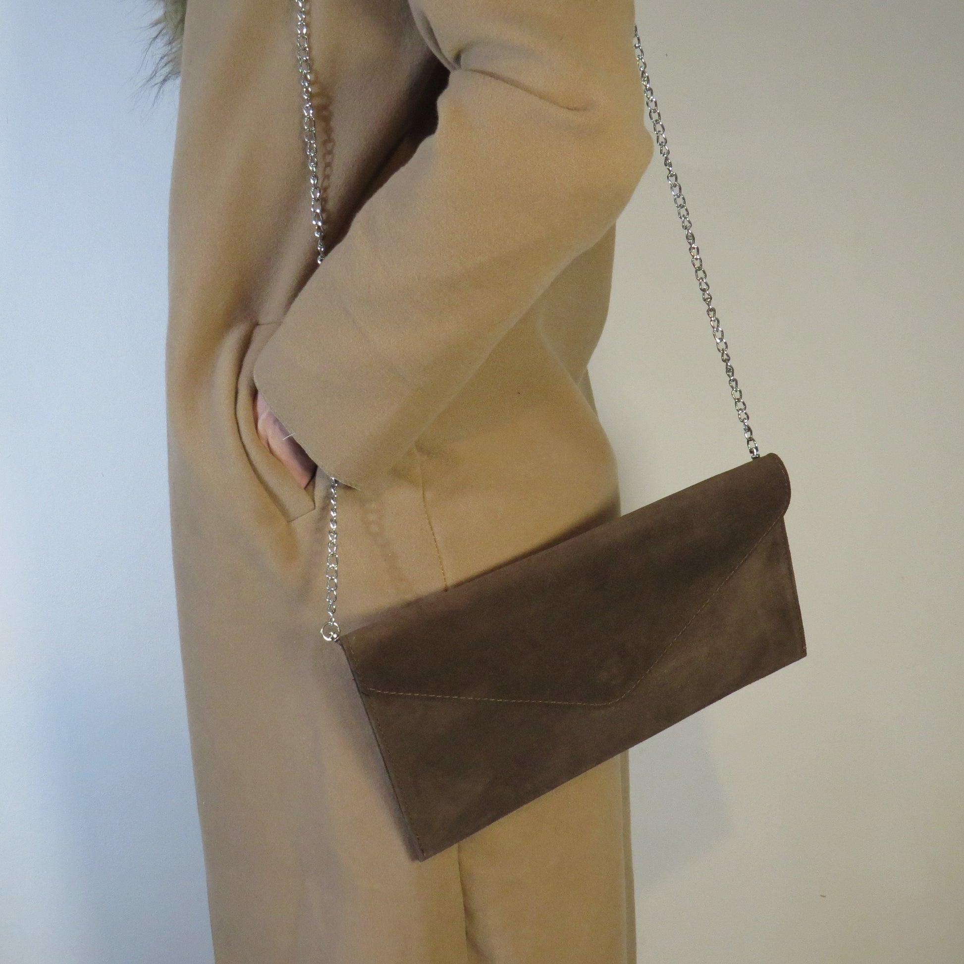 Brown envelope clutch bag with chain strap